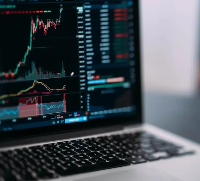 A trading platform open on a laptop screen.