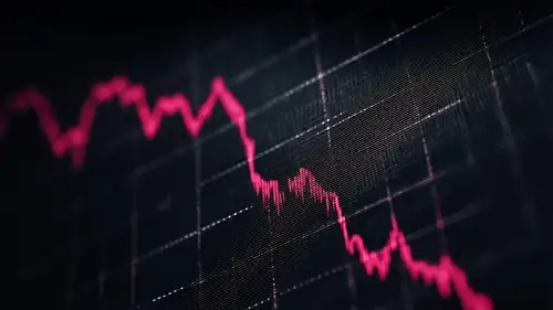 A price line falling away across a dark screen